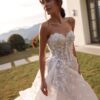 tina-valerdi-2027-lana-spalle-scoperte Abito da sposa Tina Valerdi Lana