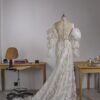 andrea-sedici-austeya-2027-copribraccia-voluminosi Abito da sposa Andrea Sedici Austeya